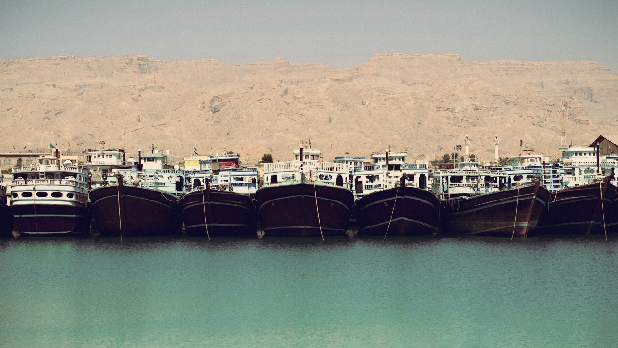 Traditional dhows moored in a row