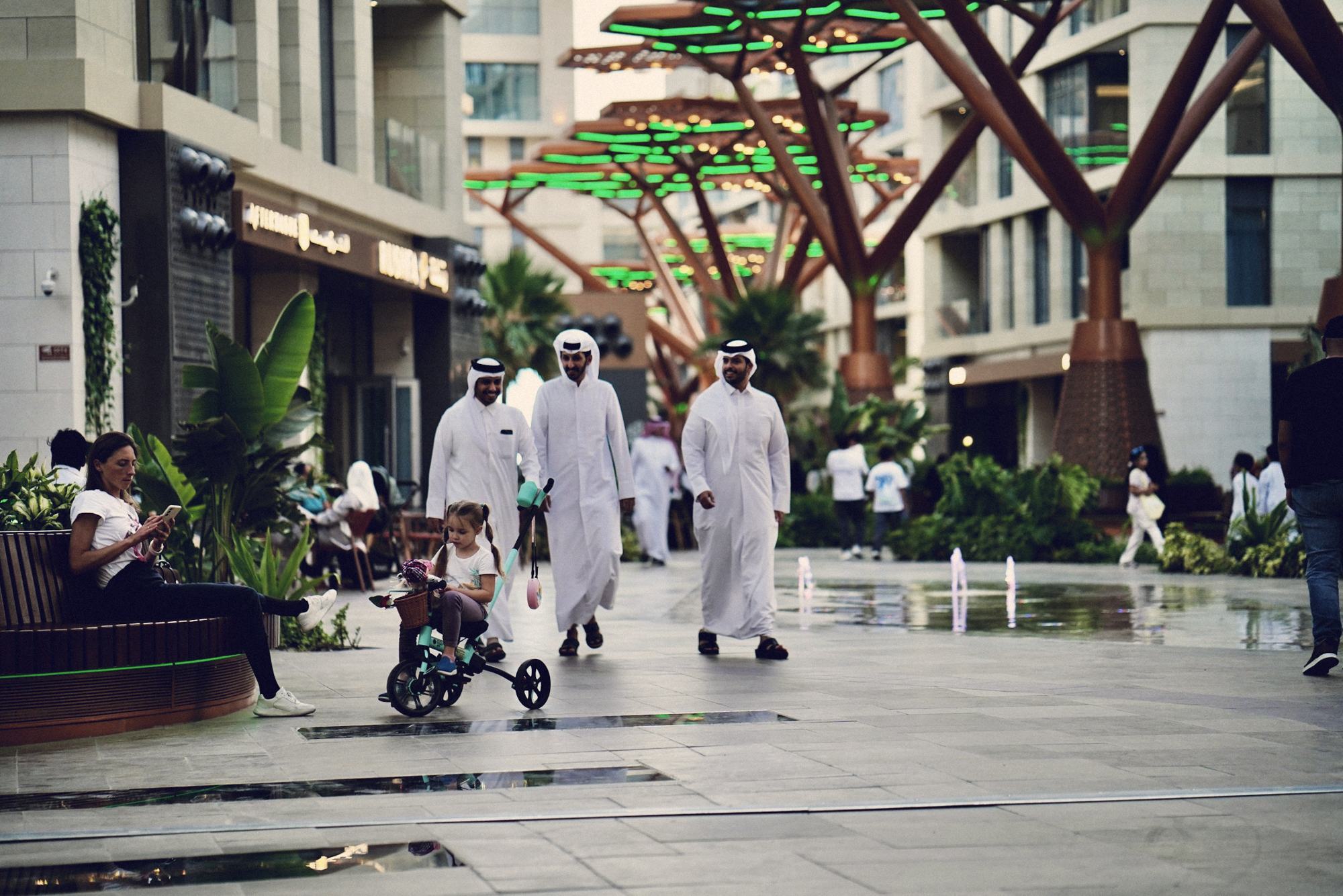 People walking through Msheireb Downtown Doha